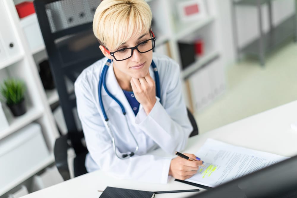 Female Doctor working on computer female doctor working one of the many chemistry careers access via chemistry